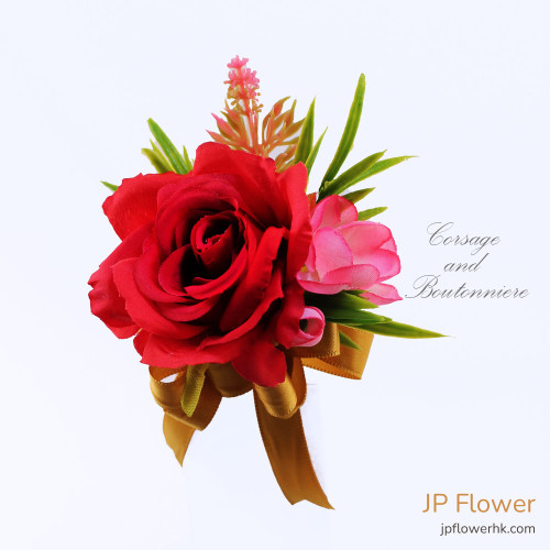 A pair of elegant red rose boutonniere and wrist corsage showcasing fine HK-made custom floral craftsmanship.