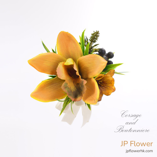 An exquisite earthy yellow fresh flower boutonnière with Cymbidium orchid and Alstroemeria, perfect for wedding VIPs and graduations.