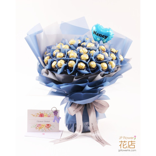 A bouquet of 12 Ferrero Rocher chocolates and everlasting silk roses, wrapped in stylish paper with a ribbon, suitable for birthdays and romantic gestures.